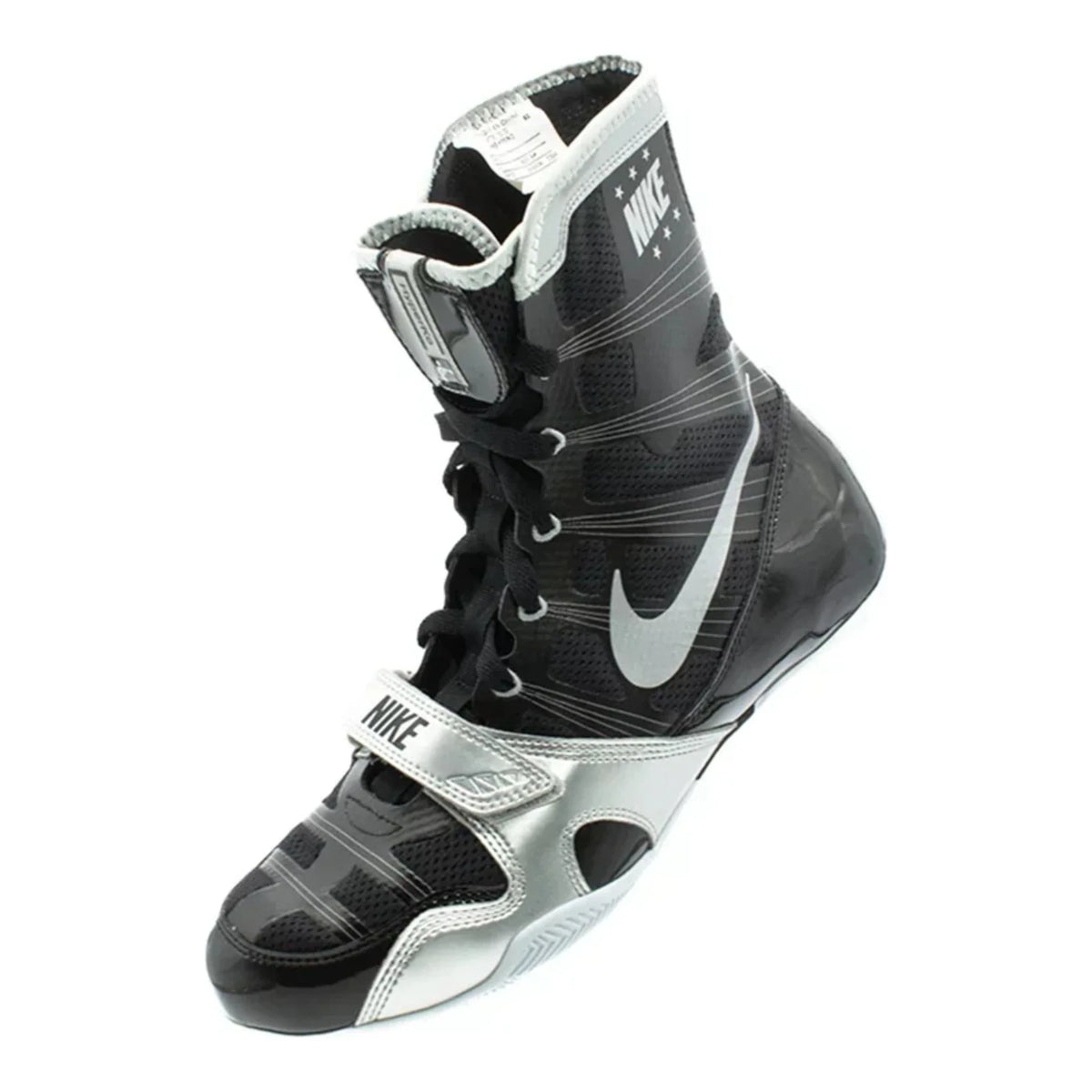 Angled view of the black and silver Nike HyperKO 1 boxing boot showing the Swoosh and forefoot strap