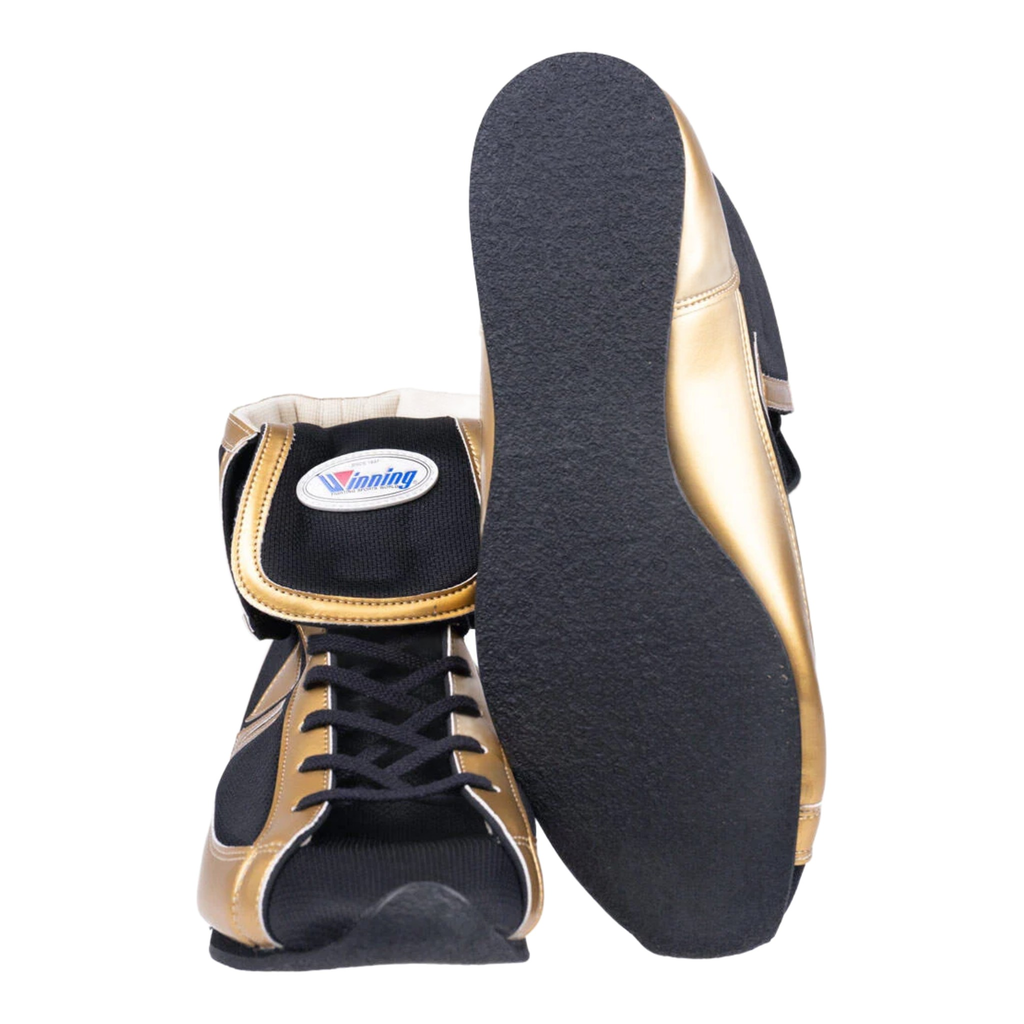 Winning Mid-Cut FOLD Type boxing boots in gold and black, showing the black rubber sole and fold-over collar