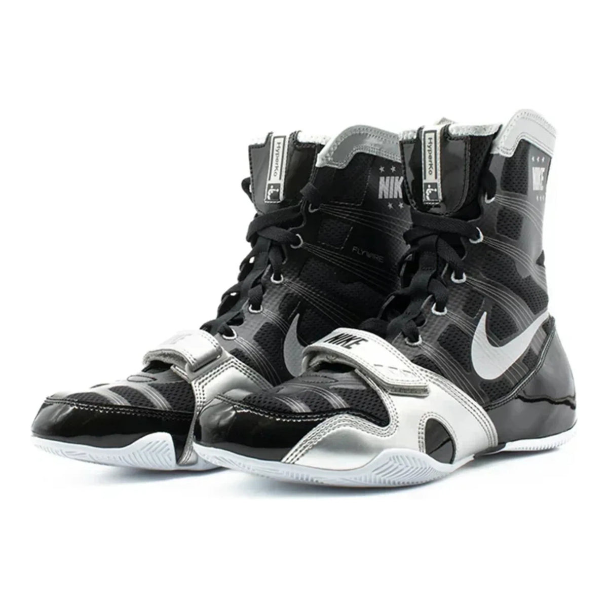 Pair of Nike HyperKO 1 boxing shoes in black and metallic silver with midfoot straps and high-top collars